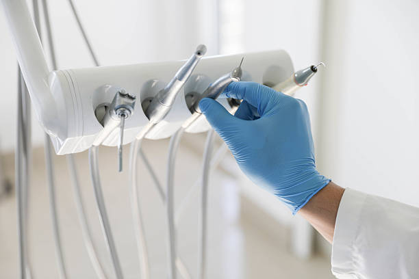 Professional Tooth Extraction technician working in Long Beach, IN